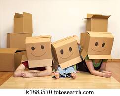 Smiley moving family - couple with a kid Smiley moving family - couple with a kid