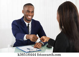Business Executive Exchanging Business Card