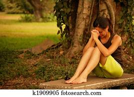 Beautiful Hispanic woman praying Beautiful Hispanic woman praying