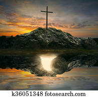 Cross and empty tomb