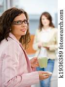 Office workers drink coffee