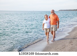 Seniors Walking on the Beach