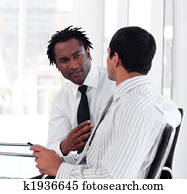 Two Business people interacting Two Business people interacting