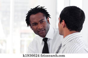 Two Business people interacting Two Business people interacting