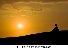 meditation under sunset meditation under sunset