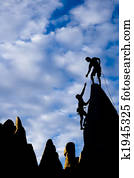 Team of climbers on the summit.