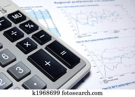 Calculator and business report.