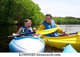 Father and son kayaking Father and son kayaking
