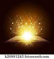 Old open book with magic light and falling stars Old open book with magic light and falling stars
