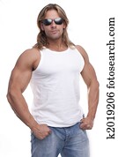 Athletic sexy male body builder with the blonde long hair. gladiator