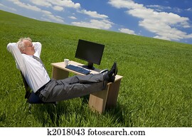 Businessman Relaxing In a Green Office