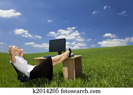 Woman Relaxing In a Green Office