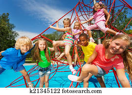 Happy group of kids on red ropes together in park