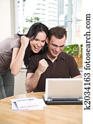 Happy couple online banking Happy couple online banking