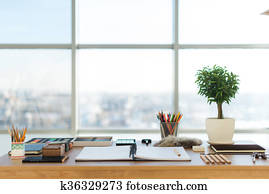 Artist workplace ready for pastel, drawing. Colorful pencils and crayons palette organized on the desktop