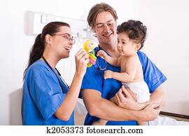 Pediatrician and baby Pediatrician and baby