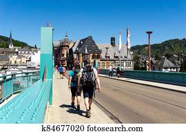 tourists cross the bridge at TrabenTrarbach during summer vacation tourists cross the bridge at TrabenTrarbach during summer vacation