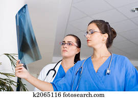 doctors examining x-ray