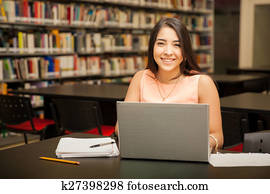 Pretty girl using a laptop computer