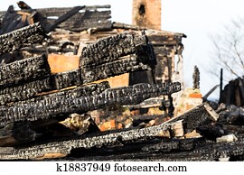 Ruins and remains of a burned down house