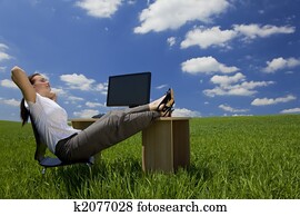 Woman Relaxing In a Green Office