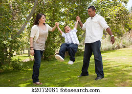 Young Family Having Fun in the Park