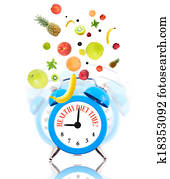 Diet concept with clock, scale dial and fruits Diet concept with clock, scale dial and fruits