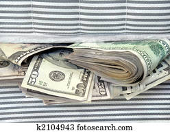 Money Stuffed in Between the Mattresses