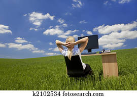 Woman Relaxing In a Green Office