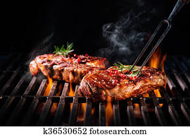 Beef steaks on the grill Beef steaks on the grill