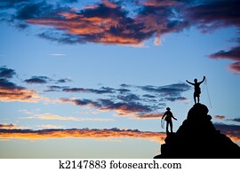 Climber on the summit. Climber on the summit.