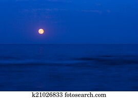 Full moon over the  sea