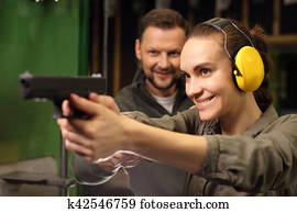 The woman at the shooting range. The woman at the shooting range.