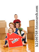 Happy family moving into a new home