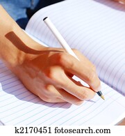 Girl Writing In Note Book Girl Writing In Note Book