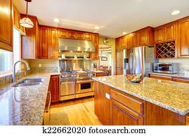 Shiny luxury kitchen room with island