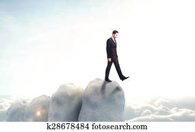 businessman falls into the abyss