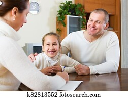 Family talking with employee Family talking with employee