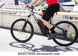 Man Riding E Bike Bicycle In City Man Riding E Bike Bicycle In City