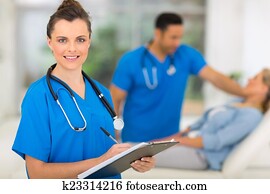 young nurse holding clipboard