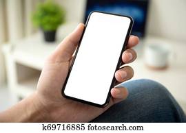 Man holding iPhone X with service Pay Pal on the screen Man holding iPhone X with service Pay Pal on the screen