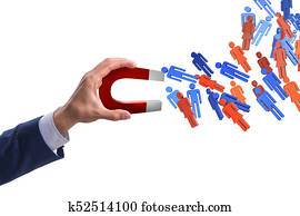 Businessman in recruitment concept with horseshoe magnet