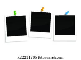 three blank polaroids with pin needles