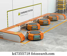 Warehouse robots charging at charging station Warehouse robots charging at charging station