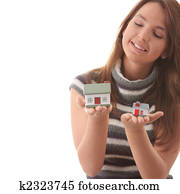 Young woman with two hose models in hands