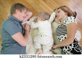 family lie on floor 2 family lie on floor 2