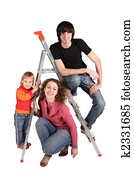 family with baby on steps