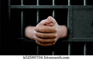 Jail Cell Door And Hands