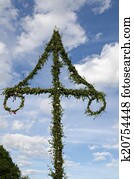 Midsummer pole at blue sky with white clouds