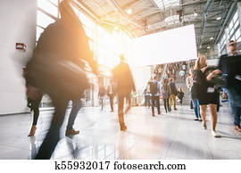 anonymous blurred people at a trade show, including copy space banner anonymous blurred people at a trade show, including copy space banner
